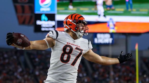 Cincinnati Bengals tight end Justin Rigg (87) reacts after scoring a touchdown against the Los Angeles Rams in the second half at Paycor Stadium.