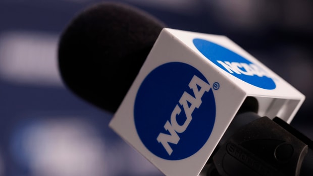 NCAA logo seen on a microphone during practice the day before the start of the First Four of the 2022 NCAA Tournament at UD Arena.