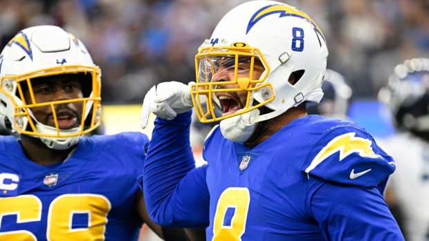 Chargers linebacker Kyle Van Noy and defensive lineman Sebastian Joseph-Day celebrate a sack in a game.