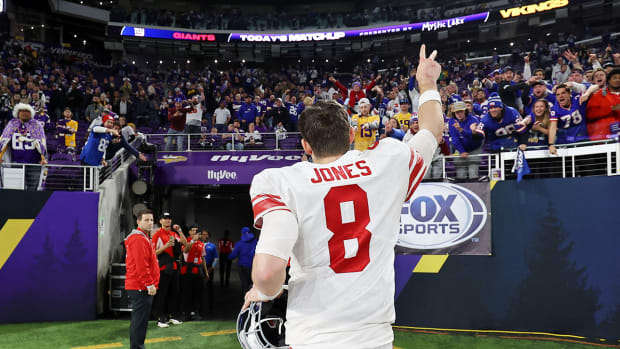 New York Giants quarterback Daniel Jones (8) reacts after winning a wild card game against the Minnesota Vikings at U.S. Bank Stadium.