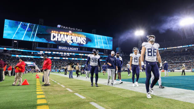 Tennessee Titans tight end Kevin Rader (86) and wide receiver Nick Westbrook-Ikhine (15) leave the field after losing to the Jacksonville Jaguars at TIAA Bank Field.