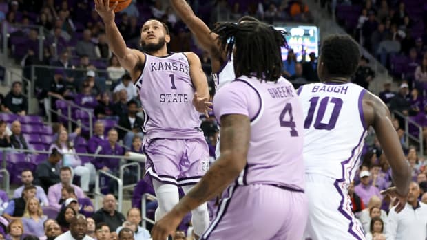 Jan 14, 2023; Fort Worth, Texas, USA; Kansas State Wildcats guard Markquis Nowell (1) shoots during the second half against the TCU Horned Frogs at Ed and Rae Schollmaier Arena.