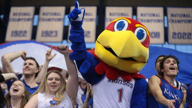 Big Jay joins the student second in cheering on Kansas during the second half of Saturday's game against Iowa State inside Allen Fieldhouse.