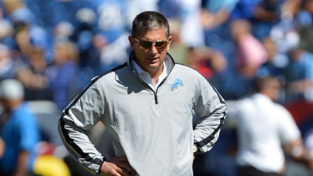 Detroit Lions head coach Jim Schwartz watches his team warm up before a game against the Tennessee Titans at LP Field.