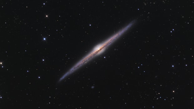 Spiral galaxy NGC 4565, in the constellation Coma Berenices, is oriented edge-on as seen from Earth. A 10-inch telescope will easily show the dusty lane through the spiral arms. A similar dusty lane can be seen in the Milky Way Band, through the Cygnus and Aquilia constellations. [Photo by Ken Crawford (Own work) [CC BY-SA 3 (https://creativecommons.org/licenses/by-sa/3)], via Wikimedia Commons] ghows-OH-200819304-fb4b6643.jpg