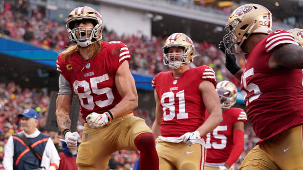 Jan 14, 2023; Santa Clara, California, USA; San Francisco 49ers tight end George Kittle (85) reacts after catching a pass for a two-point conversion in the third quarter of a wild card game against the Seattle Seahawks at Levi’s Stadium.