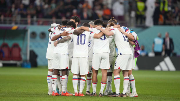 The USMNT huddling at the 2022 World Cup