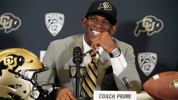 FILE - Deion Sanders speaks after being introduced as the new head football coach at the University of Colorado during a news conference Sunday, Dec. 4, 2022, in Boulder, Colo. The University of Colorado introduced a pilot program that makes the credit review for transfer students a more seamless process. It may have been the move that ultimately lured Deion “Coach Prime” Sanders to Boulder. (AP Photo/David Zalubowski, File)