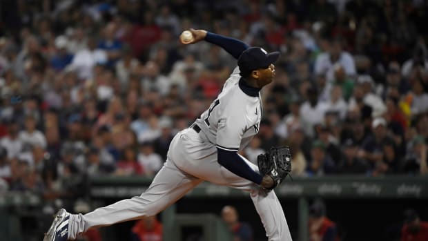 Aug 13, 2022; Boston, Massachusetts, USA; New York Yankees relief pitcher Aroldis Chapman (54) pitches during the seventh inning against the Boston Red Sox at Fenway Park. Mandatory Credit: Bob DeChiara-USA TODAY Sports