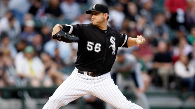 White Sox starting pitcher Mark Buehrle delivers a pitch during the second inning against the Cleveland Indians at US Cellular Field. The White Sox won 10–6.