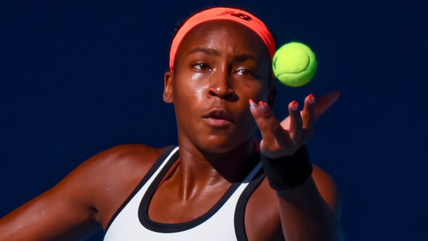 American tennis player Coco Gauff serves the ball during her fourth round match at the 2023 Australian Open.