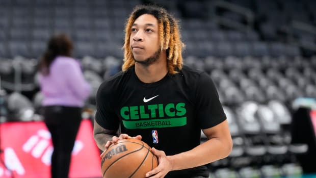 Boston Celtics guard JD Davison (20) during pregame warm ups before the game between the Charlotte Hornets and the Boston Celtics at Spectrum Center.