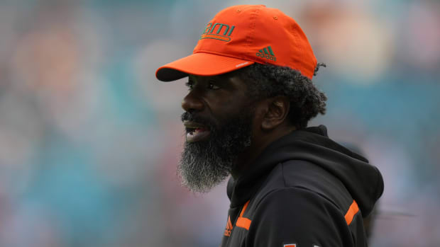 Former Miami football chief of staff Ed Reed watches from the sidelines during a game against Georgia Tech.