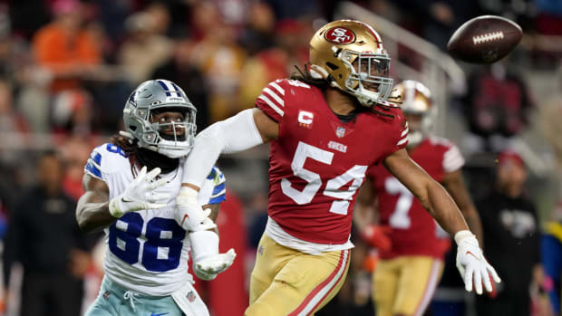 San Francisco linebacker Fred Warner breaks up a pass against the Cowboys' CeeDee Lamb during their NFC divisional playoff game.