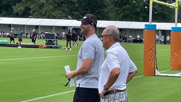 Vic Fangio visits with Nick Sirianni at training camp