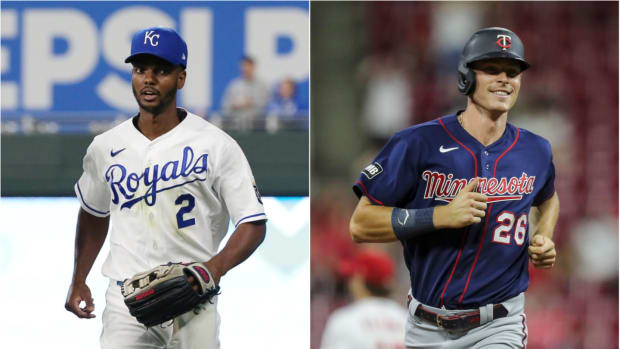 Kansas City Royals OF Michael A. Taylor with Minnesota Twins OF Max Kepler