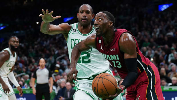 Nov 30, 2022; Boston, Massachusetts, USA; Miami Heat center Bam Adebayo (13) drives the ball against Boston Celtics center Al Horford (42) in the first quarter at TD Garden.