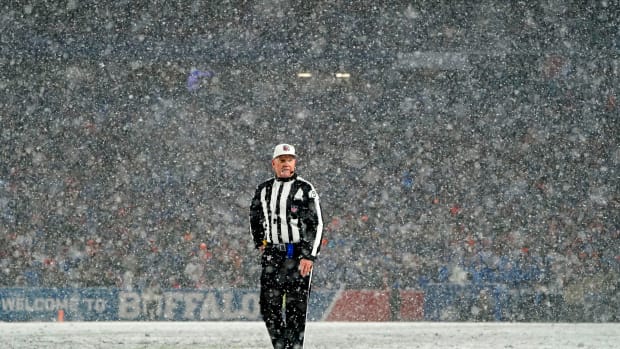 Jan 22, 2023; Orchard Park, New York, USA; referee Carl Cheffers (51) looks on during the fourth quarter of an AFC divisional round game between the Buffalo Bills and the Cincinnati Bengals at Highmark Stadium. Mandatory Credit: Gregory Fisher-USA TODAY Sports