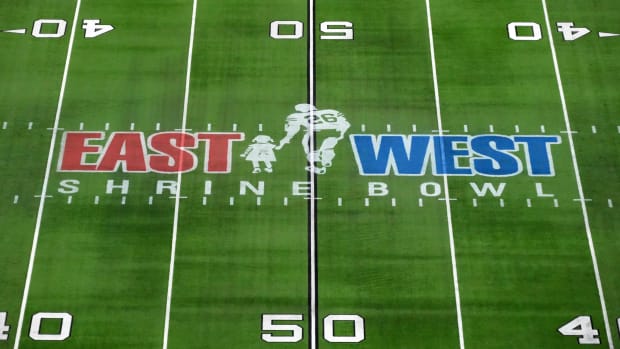Feb 3, 2022; Las Vegas, NV, USA; A detailed view of the East-West Shrine Bowl logo at midfield at Allegiant Stadium.