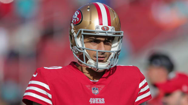 49ers quarterback Jimmy Garoppolo warms up before the game vs. the Dolphins.