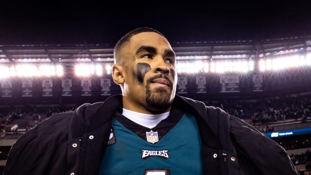 Philadelphia Eagles quarterback Jalen Hurts (1) walks off the field after a victory against the New York Giants in an NFC divisional round game at Lincoln Financial Field.