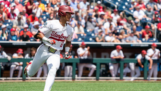 Jun 18, 2022; Omaha, NE, USA; Stanford Cardinal right fielder Braden Montgomery (6) heads for first base after hitting a single during the first inning against the Arkansas Razorbacks at Charles Schwab Field. Mandatory Credit: Dylan Widger-USA TODAY Sports