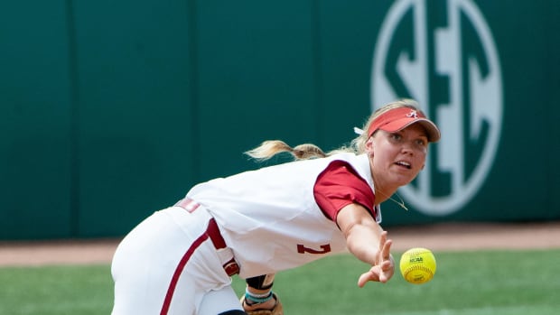 Alabama shortstop Bailey Dowling (7) flips to second to force out a Stanford runner. The Stanford Cardinal defeated the Alabama Crimson Tide 6-0 to claim the NCAA Tuscaloosa Regional title Sunday.