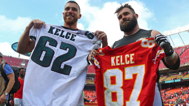 Chiefs tight end Travis Kelce and Eagles center Jason Kelce swap jerseys after a game.