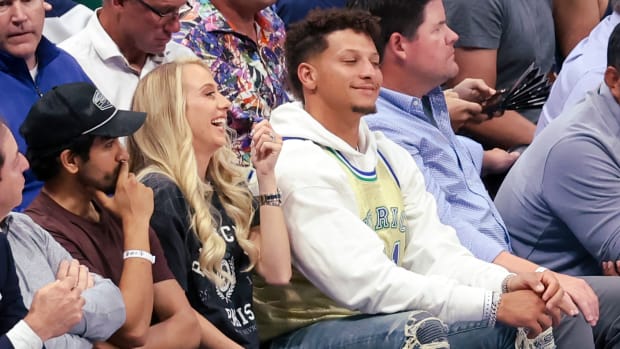 May 22, 2022; Dallas, Texas, USA; Kansas City Chiefs quarterback Patrick Mahomes and wife Brittany watch the game between the Dallas Mavericks and Golden State Warriors during the second quarter in game three of the 2022 Western Conference finals at American Airlines Center. Mandatory Credit: Kevin Jairaj-USA TODAY Sports