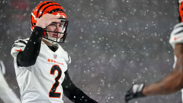 Cincinnati Bengals place kicker Evan McPherson (2) gestures toward a teammate after a kickoff in the fourth quarter during an NFL divisional playoff football game between the Cincinnati Bengals and the Buffalo Bills, Sunday, Jan. 22, 2023, at Highmark Stadium in Orchard Park, N.Y.