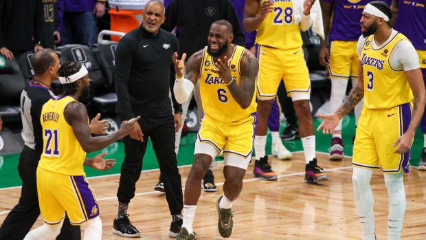 Lakers forwards LeBron James and Anthony Davis react to a missed call in a game vs. the Celtics.