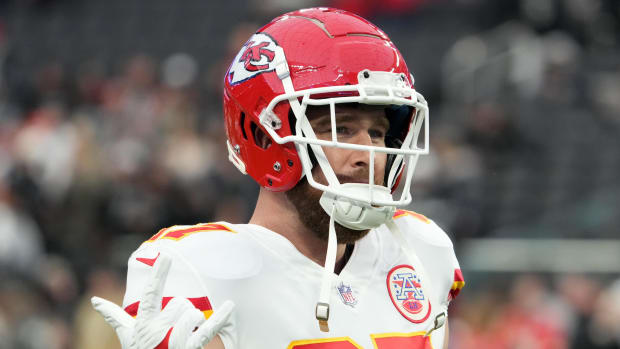 Chiefs tight end Travis Kelce (87) looks on before a game against the Raiders.