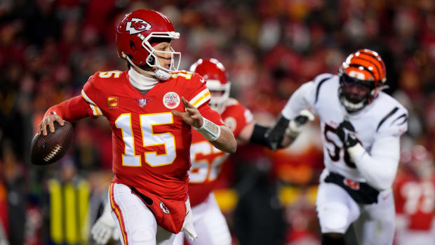 Kansas City Chiefs quarterback Patrick Mahomes (15) runs out of the pocket in the second quarter during the AFC championship NFL game between the Cincinnati Bengals and the Kansas City Chiefs, Sunday, Jan. 29, 2023, at GEHA Field at Arrowhead Stadium in Kansas City, Mo. The Kansas City Chiefs lead the Cincinnati Bengals, 13-6, at halftime. Cincinnati Bengals At Kansas City Chiefs Afc Championship Jan 29 0137