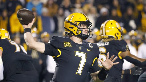 Appalachian State Mountaineers quarterback Chase Brice (7) throws a pass during the first quarter against the Georgia State Panthers at Kidd Brewer Stadium.