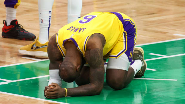 Los Angeles Lakers forward LeBron James reacts during the second half against the Boston Celtics at TD Garden.