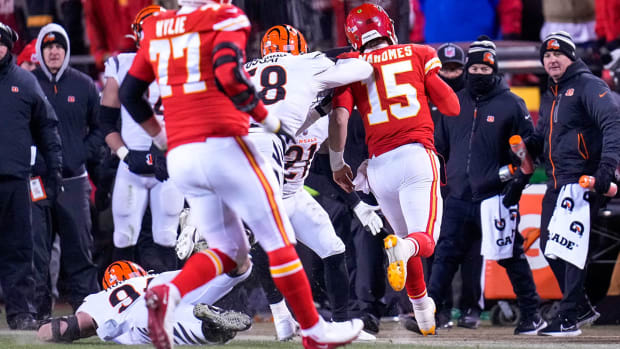 Joseph Ossai shoves Patrick Mahomes out of bounds to draw a penalty in the AFC championship game.