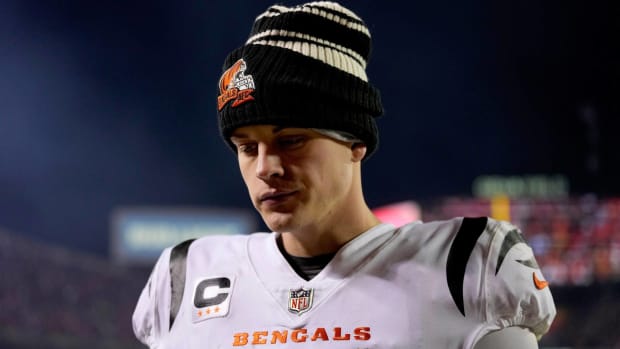 Bengals quarterback Joe Burrow walks off the field after an AFC championship game loss to the Chiefs.