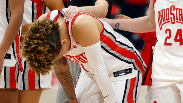 Ohio State guard Rikki Harris reacts following the Buckeyes’ 73-65  loss to Purdue.