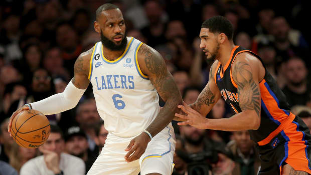 Jan 31, 2023; New York, New York, USA; Los Angeles Lakers forward LeBron James (6) controls the ball against New York Knicks forward Obi Toppin (1) during the second quarter at Madison Square Garden.