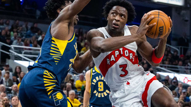 Toronto Raptors forward O.G. Anunoby (3) shoots the ball while Indiana Pacers forward Jalen Smith (25) defends in the second half at Gainbridge Fieldhouse.