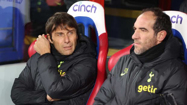 Tottenham manager Antonio Conte (left) and assistant Cristian Stellini pictured in the dugout during a Premier League game against Crystal Palace in January 2023