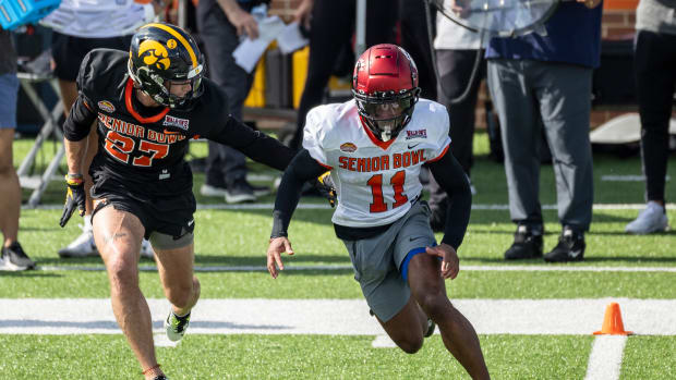 Jan 31, 2023; Mobile, AL, USA; National defensive back Riley Moss of Iowa (27) practices with National wide receiver Tre Tucker of Cincinnati (11) during the first day of Senior Bowl week at Hancock Whitney Stadium in Mobile. Mandatory Credit: Vasha Hunt-USA TODAY Sports