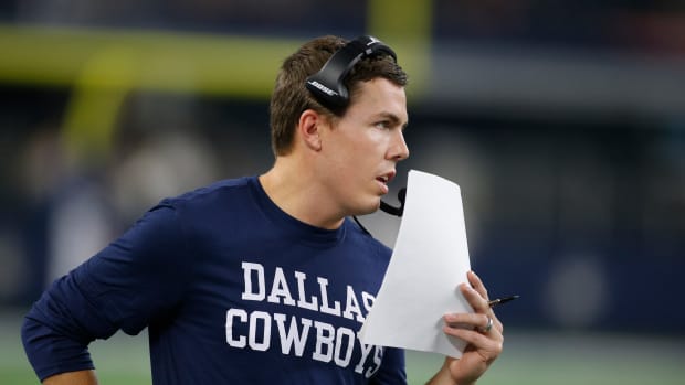 Aug 29, 2019; Arlington, TX, USA; Dallas Cowboys offensive coordinator Kellen Moore on the field during the game against the Tampa Bay Buccaneers at AT&T Stadium. Mandatory Credit: Tim Heitman-USA TODAY Sports