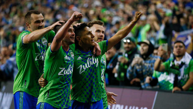 Sounders players celebrate winning the Concacaf Champions League.