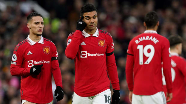 Casemiro pictured (center) walking off the field after being shown a red card in Manchester United's EPL game against Crystal Palace in February 2023