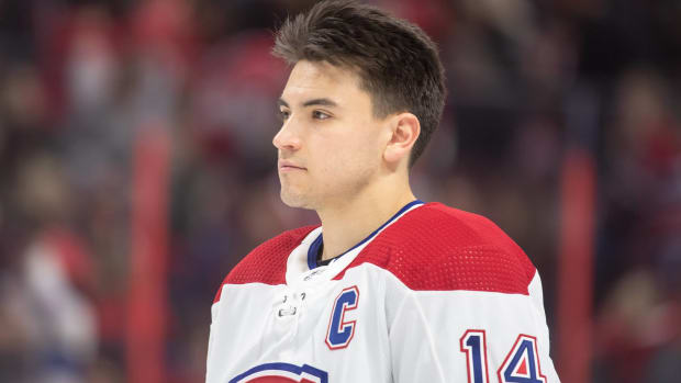 Canadiens captain Nick Suzuki looks on during the National Anthem before a game.