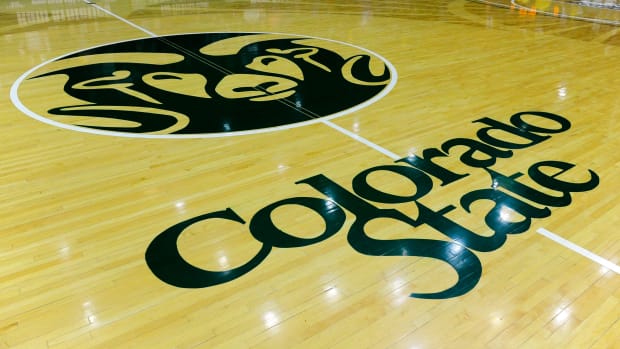 General view of the Colorado State logo on the basketball court before the start of a game.
