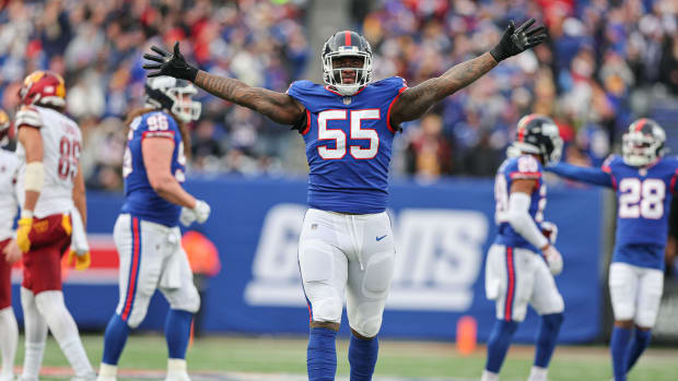 Dec 4, 2022; East Rutherford, New Jersey, USA; New York Giants linebacker Jihad Ward (55) celebrates a defensive stop during the second half against the Washington Commanders at MetLife Stadium.