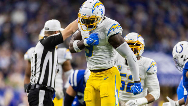 Dec 26, 2022; Indianapolis, Indiana, USA; Los Angeles Chargers linebacker Kenneth Murray Jr. (9) celebrates his sack in the first half against the Indianapolis Colts at Lucas Oil Stadium. Mandatory Credit: Trevor Ruszkowski-USA TODAY Sports