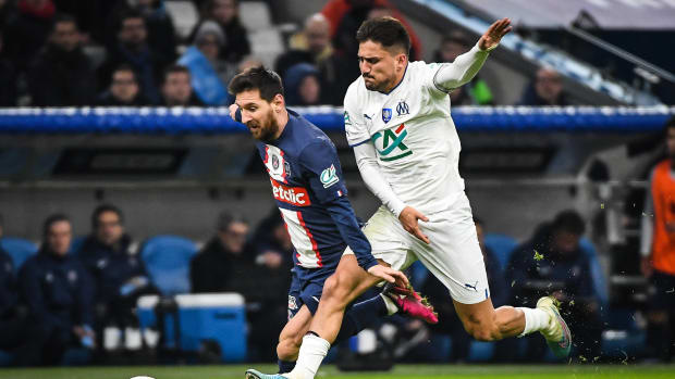 An action shot taken of Lionel Messi (left) and Cengiz Under during Marseille's 2-1 win over PSG in February 2023
